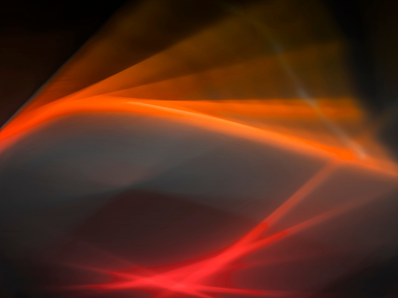 Orange and red lights on black background | Calibrate Strategies Frequently Asked Questions FAQs